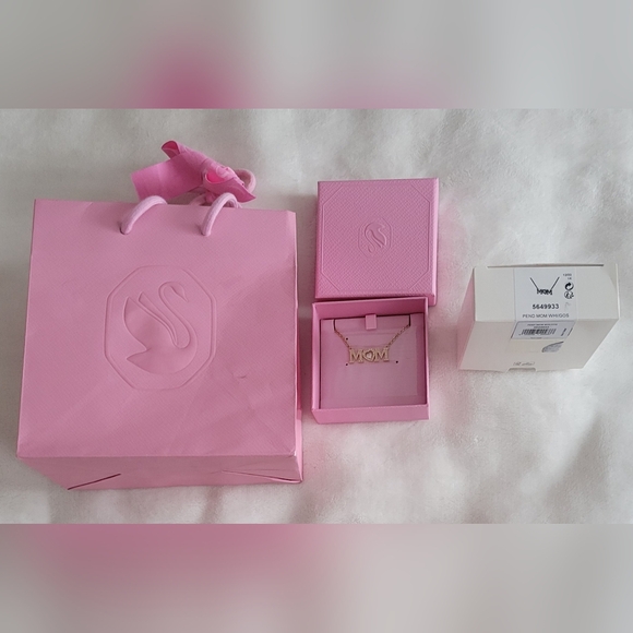 Swarovski Jewelry - Swarovski Gold 'Mom' Necklace with Box And Pink Packaging Bag. Brand New.